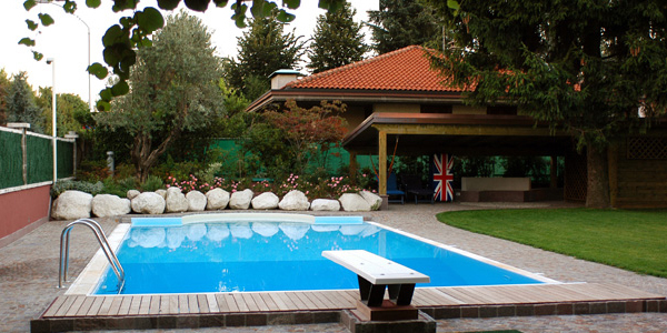 A swimming pool with garden